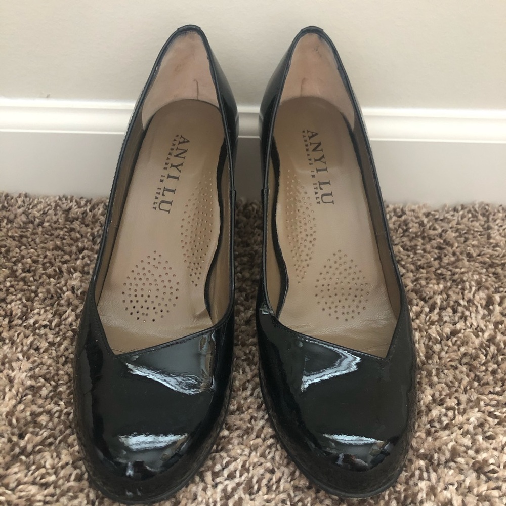Black patent leather heel.